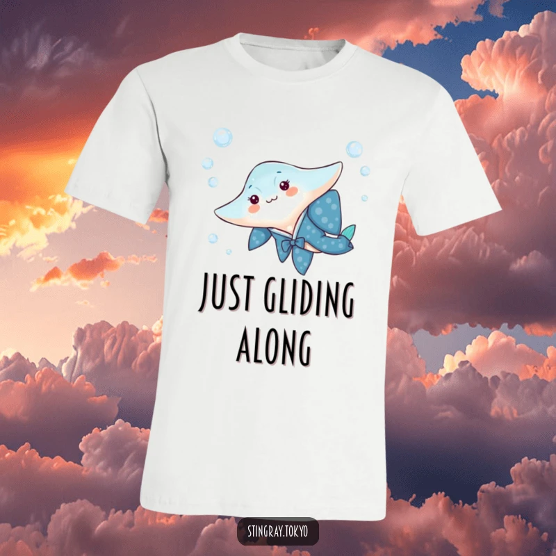 Funny t-shirt featuring a stingray wearing a vibrant blue kimono, playfully gliding through shimmering water bubbles.